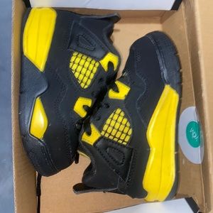 Jordan 4 Yellow and black worn a few times. Still look new!